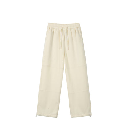 Women's Loose Fleece Jogging Pants with Drawstring Waistband, Side Pockets, and Adjustable Hem
