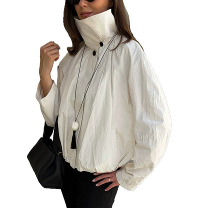 Women's short jacket with high stand-up collar, gathered shoulder area, and elastic hem EVA-US