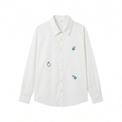 Women's oversized shirt blouse with fine embroidery appliqués and elongated hem down