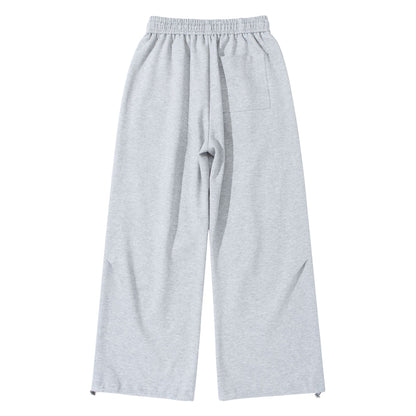Unisex Wide French-Terry Sweatpants with elastic drawstring waistband, side pockets, and adjustable hem