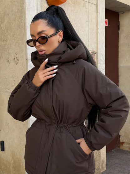 Women's quilted parka with high collar, fitted drawstring, and hood EVA-US