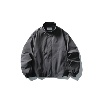 Unisex Short Cut Technical Boxy Bomber with Stand-up Collar, Snap Placket and Elastic Cuffs EVA-US