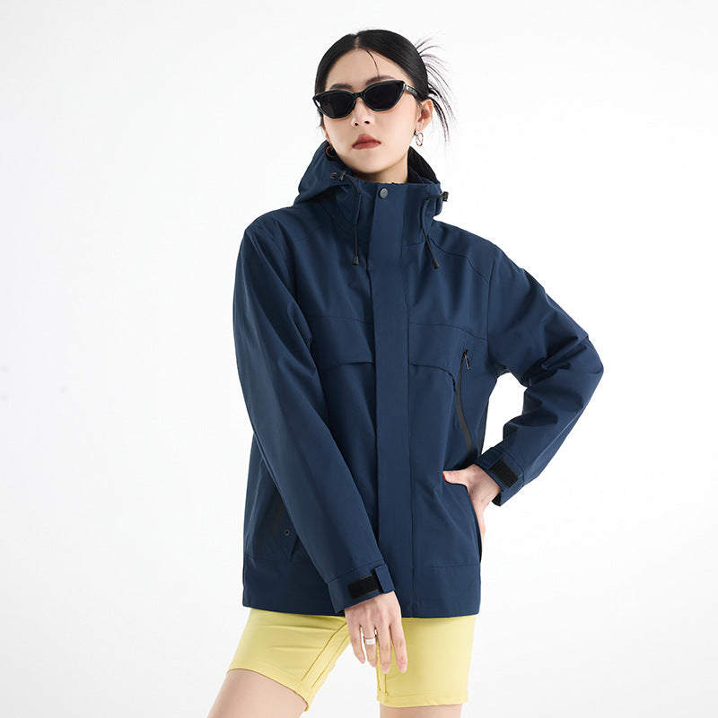 Women's technical waterproof oversized parka with hood and concealed zip pockets EVA-US