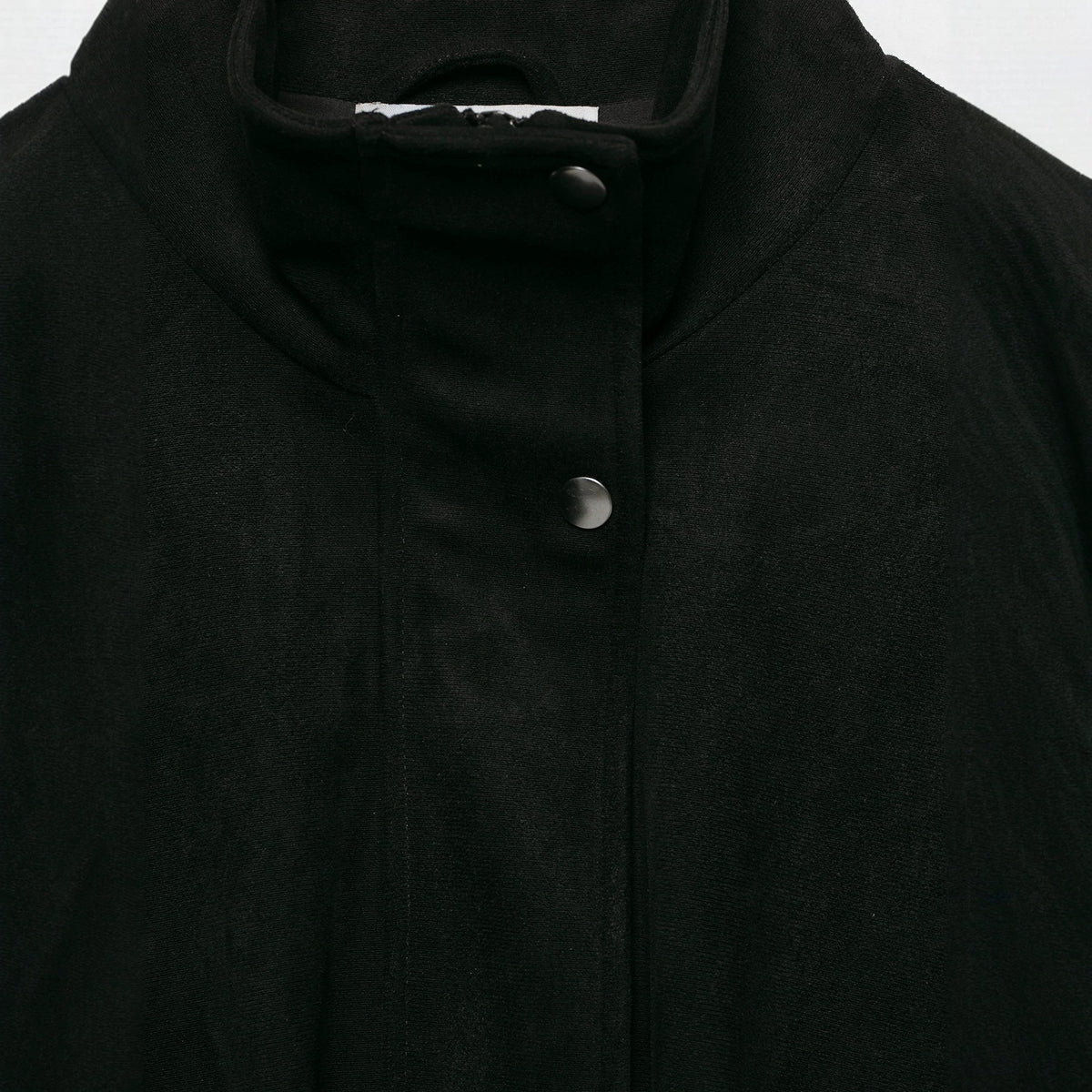 Women's tailored velvet bomber jacket with stand-up collar, shoulder epaulettes, and large flap pockets