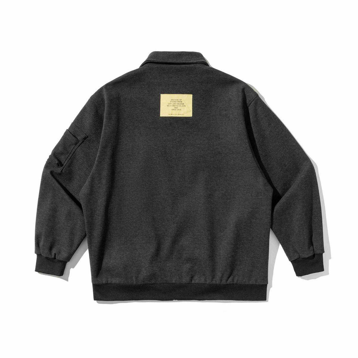 Men's short blouson in utility style with padded front, zip chest pockets and ribbed cuffs
