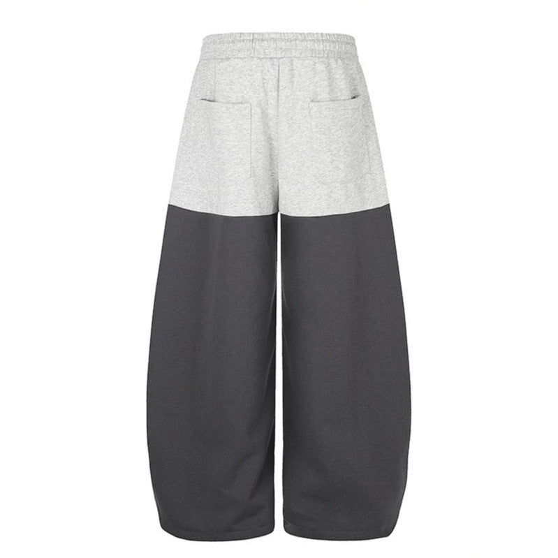Women's Oversize Two-Tone Palazzo Sweatpants made of French Terry with logo studs, drawstring and adjustable hem.