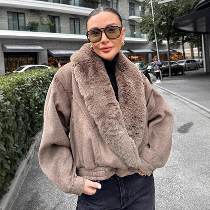 Women’s short jacket with voluminous faux fur shawl collar and elastic hem EVA-US