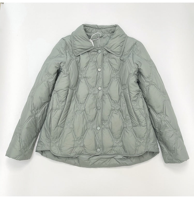Women Short Cut Quilted Jacket with Decorative Stitching and Rounded Hem EVA-US