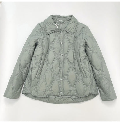 Women Short Cut Quilted Jacket with Decorative Stitching and Rounded Hem EVA-US