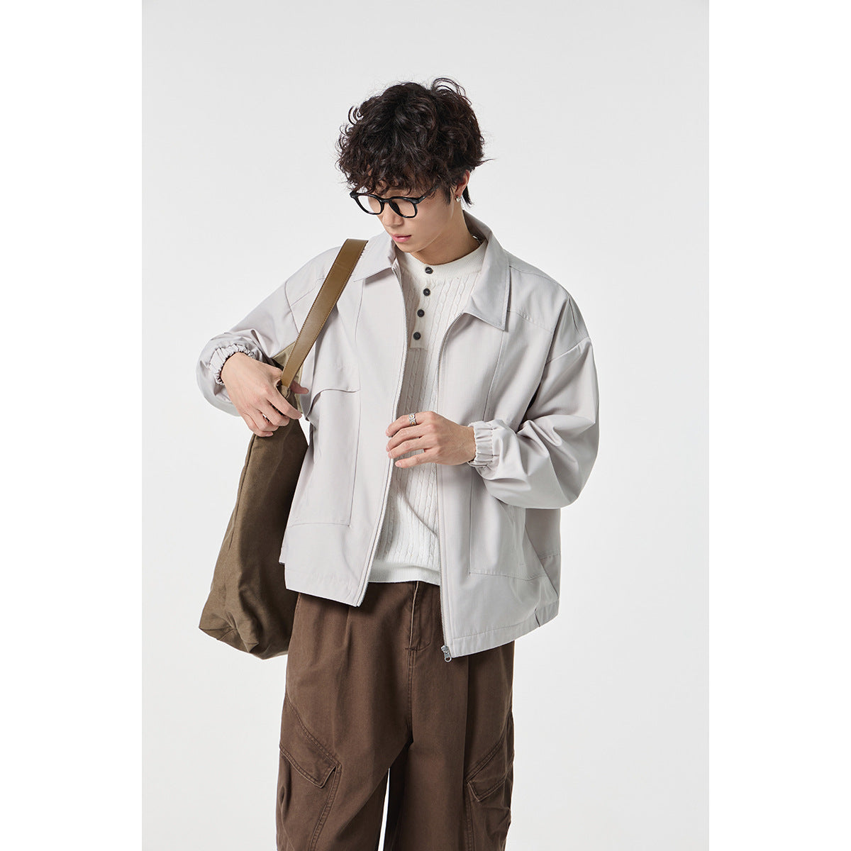 Unisex short jacket in boxy cut with continuous zipper and flap pockets EVA-US