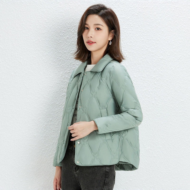 Women Short Cut Quilted Jacket with Decorative Stitching and Rounded Hem EVA-US