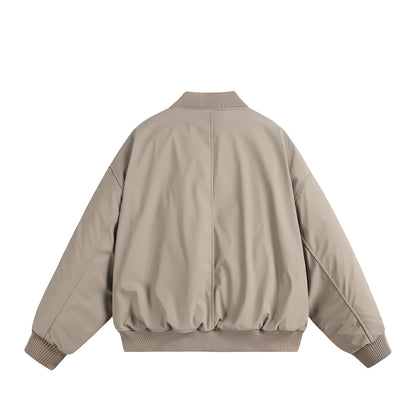 Unisex Short Cut Oversized Puffer Jacket with Utility Arm Pocket and Ribbed Cuffs EVA-US