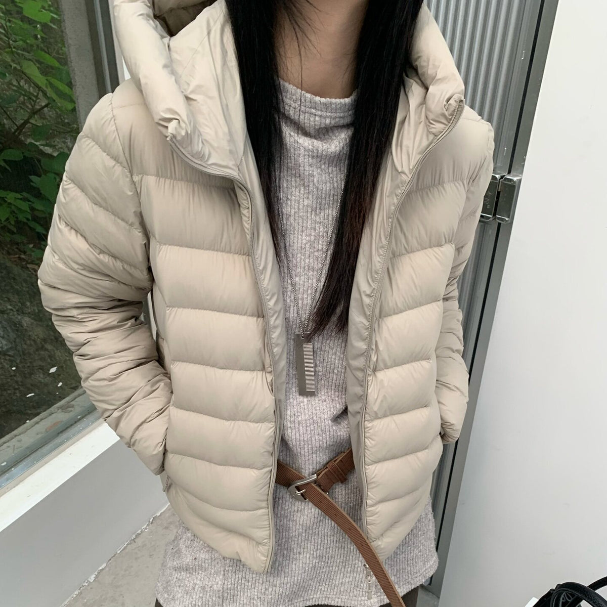 Women's quilted down jacket with high collar and light thermal insulation EVA-US