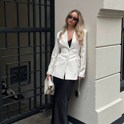 Women's tailored blazer with deep V-neck, zipper front and drawstring detail EVA-US