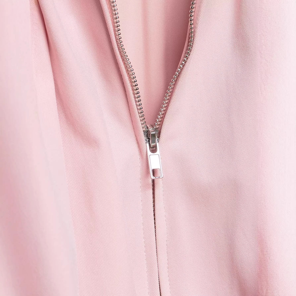 Women's short cut blouson jacket with wide balloon sleeves, zipper, and elastic hem EVA-US