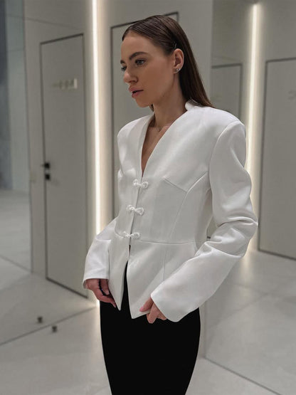 Women's peplum blazer with mandarin-like neckline and decorative knot fastenings EVA-US