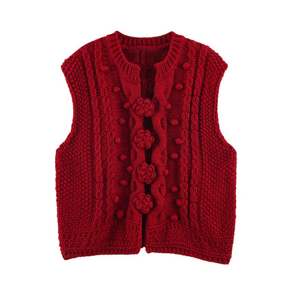 Women's knitted vest with cable pattern, flower appliqués and bobble texture EVA-US