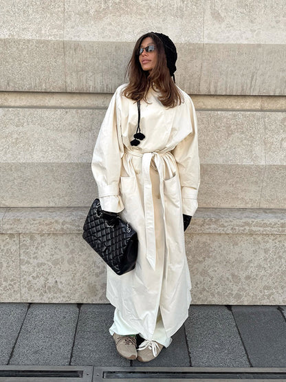 Women's maxilength tailored trench coat made of a light cotton blend with a tie belt EVA-US