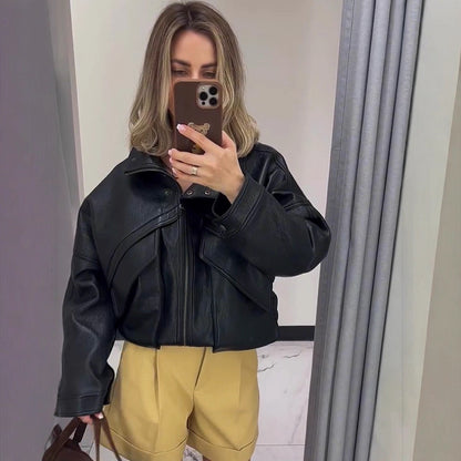 Women's oversized bomber jacket made of textured faux leather with overlapping flap front EVA-US