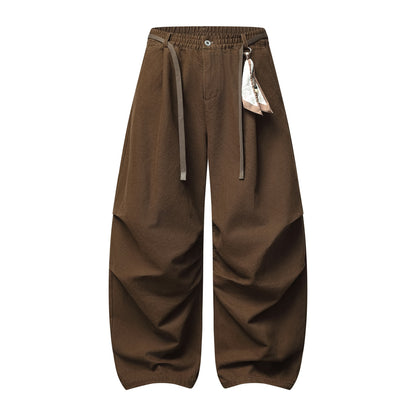 Ladies wide culotte pants with elastic waistband, pleats and decorative scarf pendant EVA-US