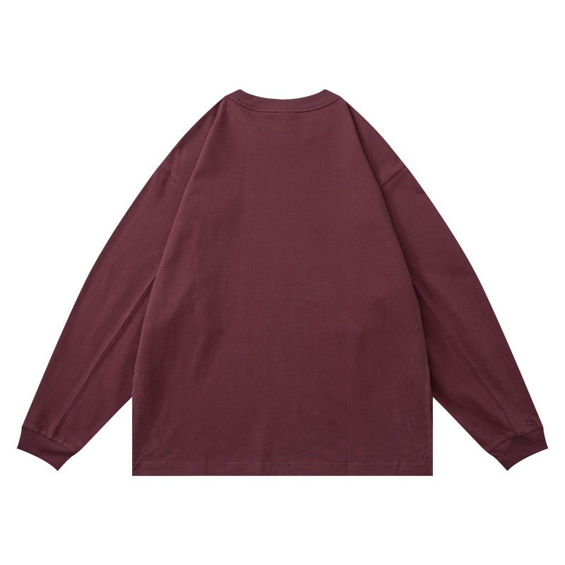 Unisex Oversized Long Sleeve Shirt made of heavy cotton blend with round neck and subtle chest embroidery EVA-US