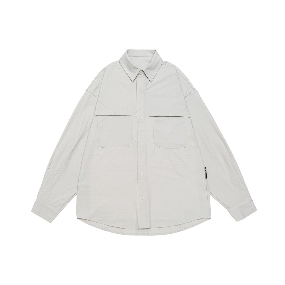 Unisex Loose-fitting shirt jacket in utility style with snap button placket EVA-US