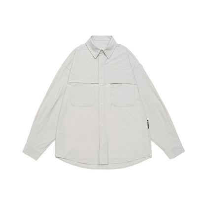 Unisex Loose-fitting shirt jacket in utility style with snap button placket EVA-US