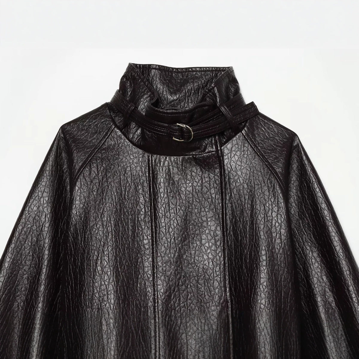 Women's short jacket made of faux leather with high buckle collar and waist belt EVA-US