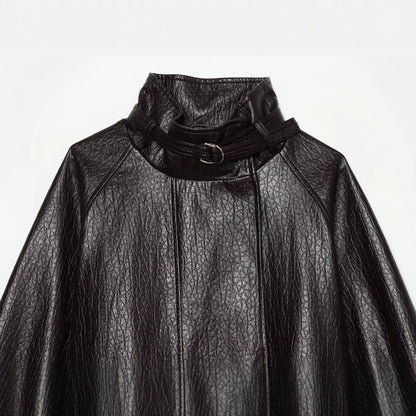 Women's short jacket made of faux leather with high buckle collar and waist belt EVA-US