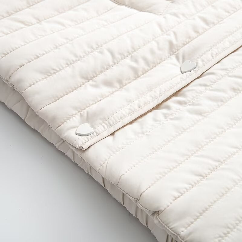 Women's short quilted jacket with vertical quilting, shirt collar and heart button placket EVA-US