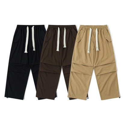 Unisex Wide Utility Cargo Pants with Elastic Waistband, Drawstring, and Adjustable Hem