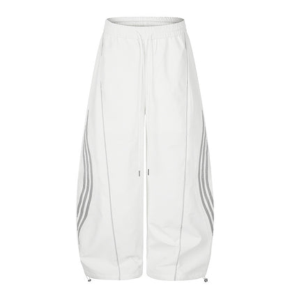 Women's Wide Tech Material Palazzo Pants with Drawstring Waistband, Reflective Side Stripes and Adjustable Cord Hem