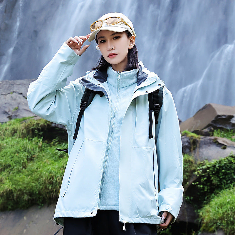 Women’s technical multi-layer hardshell rain jacket with adjustable hood, chest strap, and water-resistant zippers EVA-US