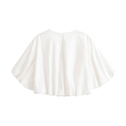 Women's loose cape top made of flowing satin with round neck