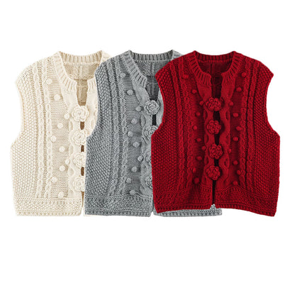 Women's knitted vest with cable pattern, flower appliqués and bobble texture EVA-US