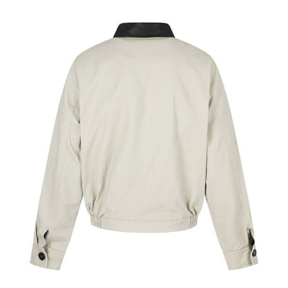 Men's short-cut boxy blouson with asymmetrical button placket, waist belt, and contrast collar EVA-US