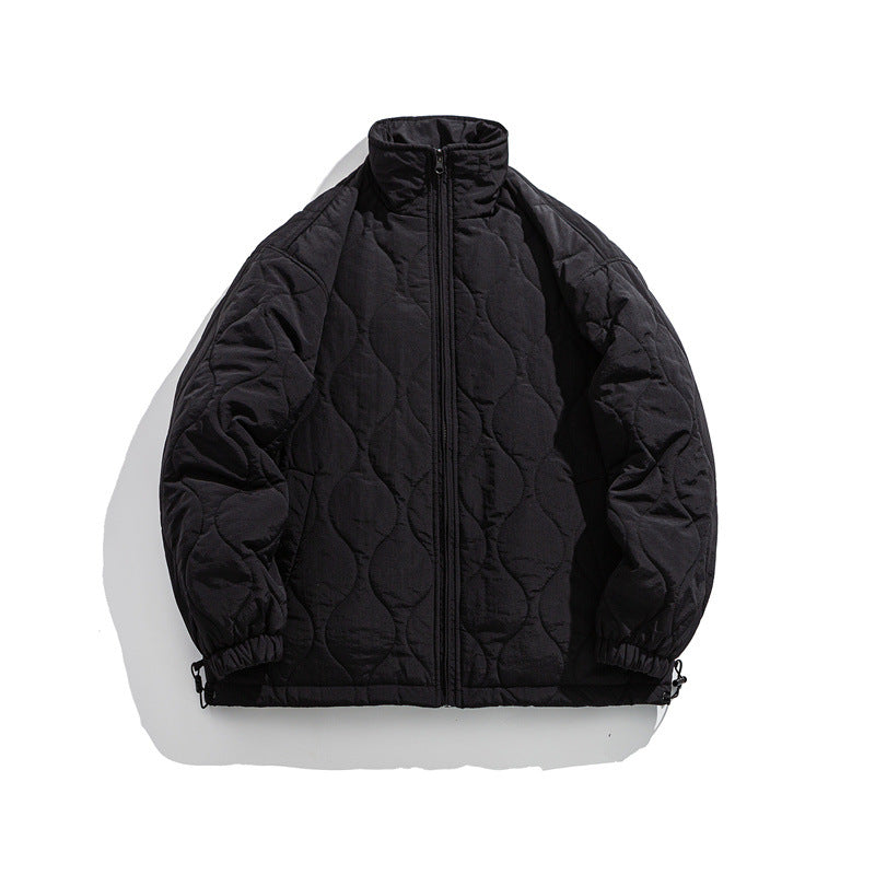 Unisex Boxy quilted jacket in military liner style with high stand-up collar and adjustable hem EVA-US