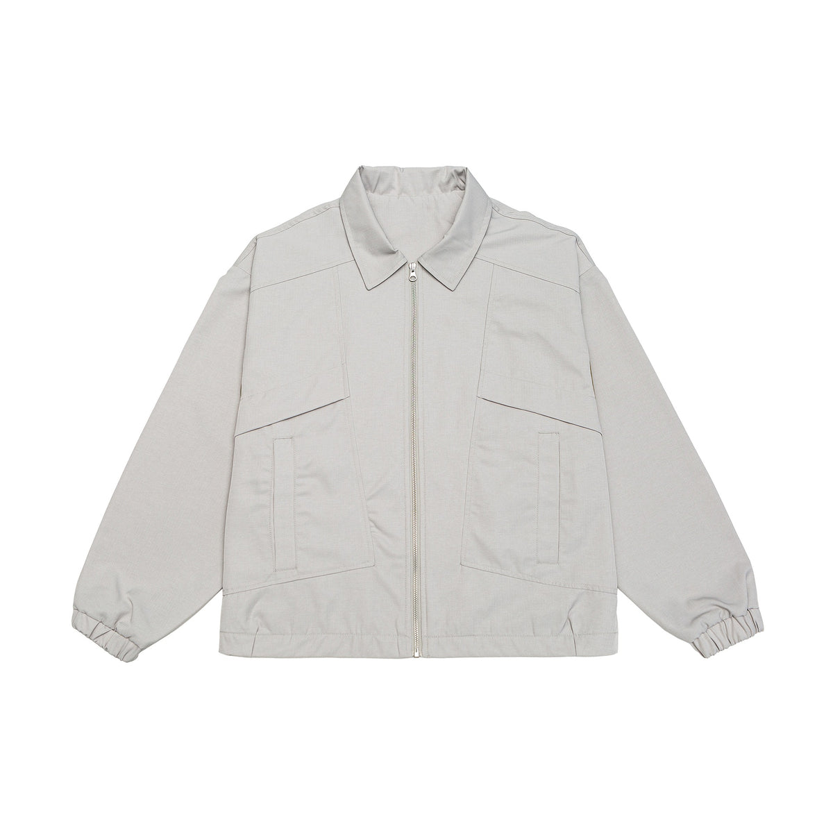 Unisex short jacket in boxy cut with shirt collar, visible metal zipper and utility patch pockets EVA-US