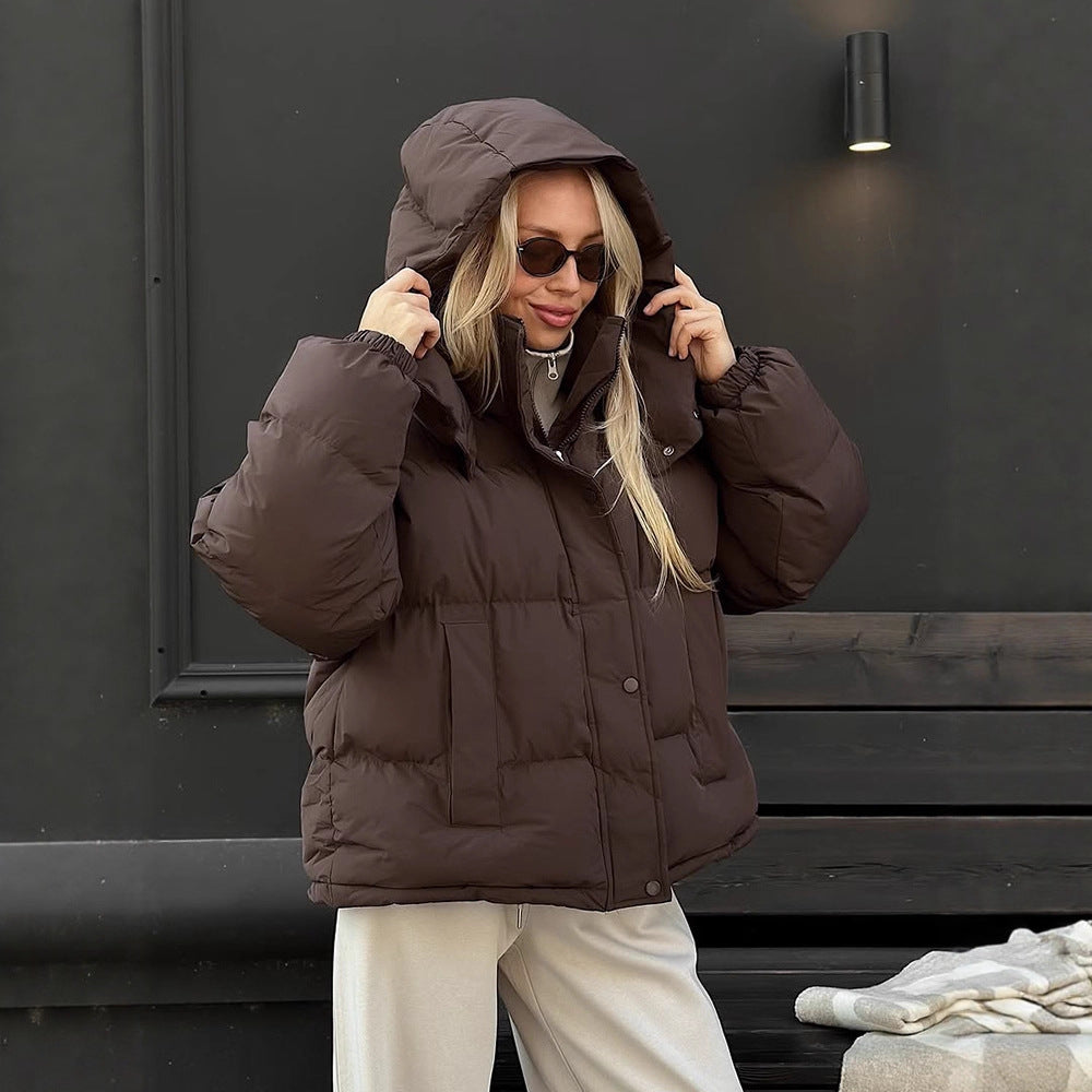 Women's short-cut oversized quilted jacket with high stand-up collar and concealed snap button placket EVA-US