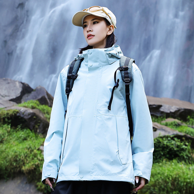 Women’s technical multi-layer hardshell rain jacket with adjustable hood, chest strap, and water-resistant zippers EVA-US