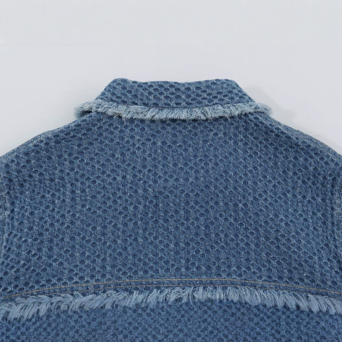 Women's short jacket made of textured denim with fringe trim and flap pockets EVA-US