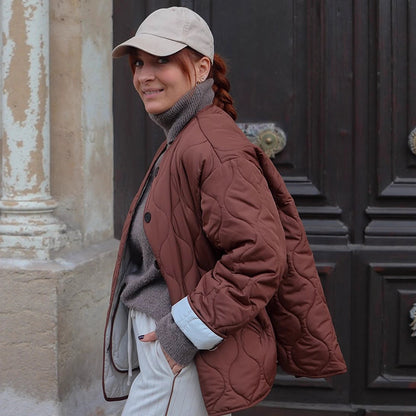 Women's quilted transitional jacket with round quilting, boxy silhouette and press stud placket EVA-US