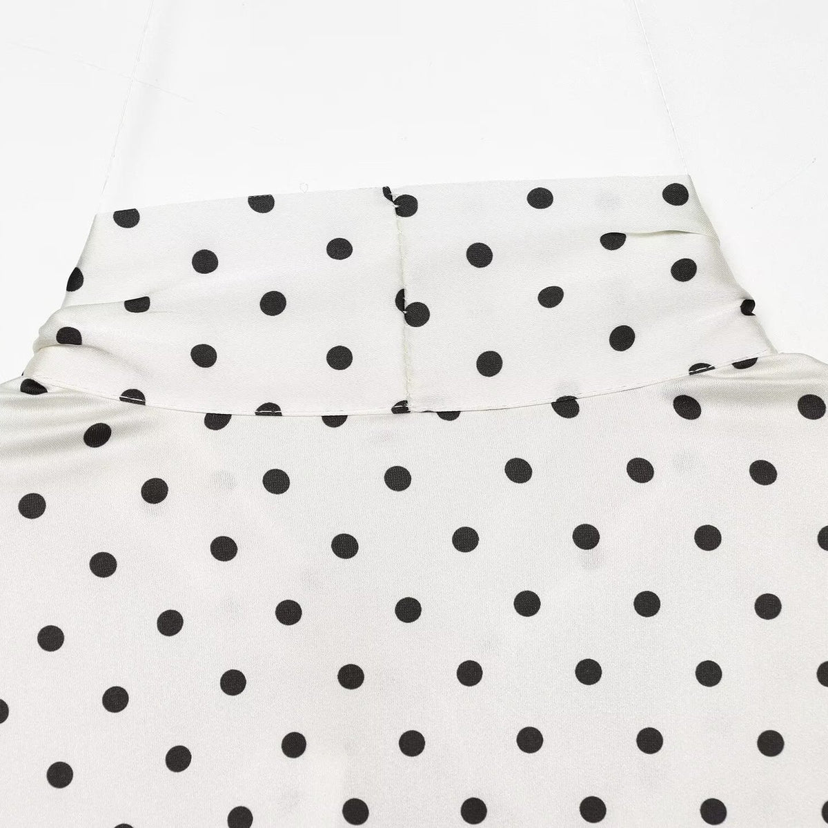 Women's blouse with bow collar, polka dot pattern and flounce sleeves EVA-US