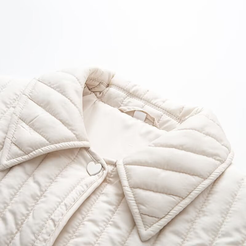 Women's short quilted jacket with vertical quilting, shirt collar and heart button placket EVA-US