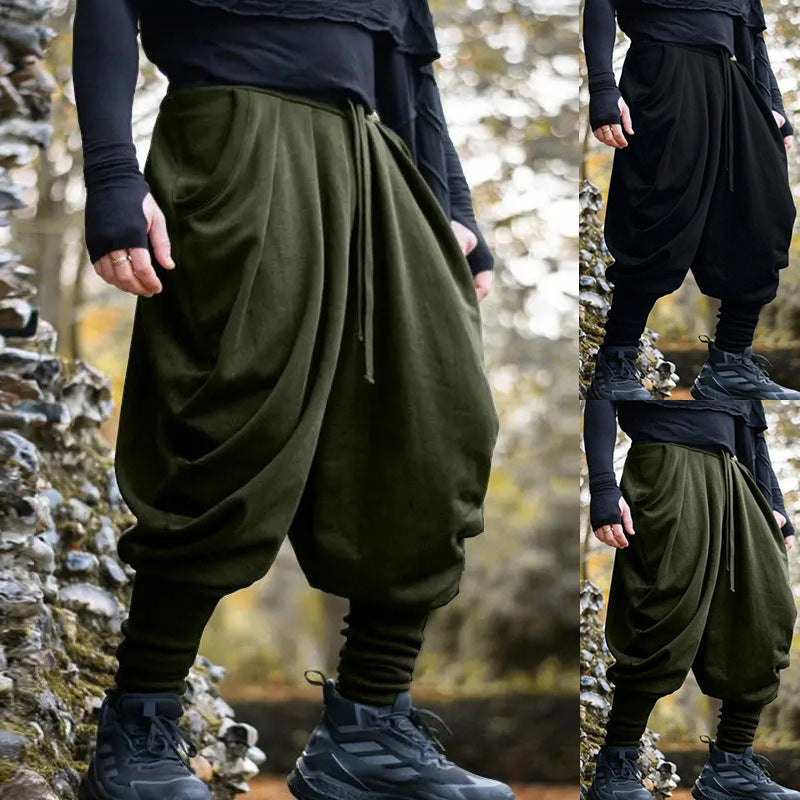 Men's avant-garde harem pants with wrap front, elastic waistband, and narrow lower leg EVA-US