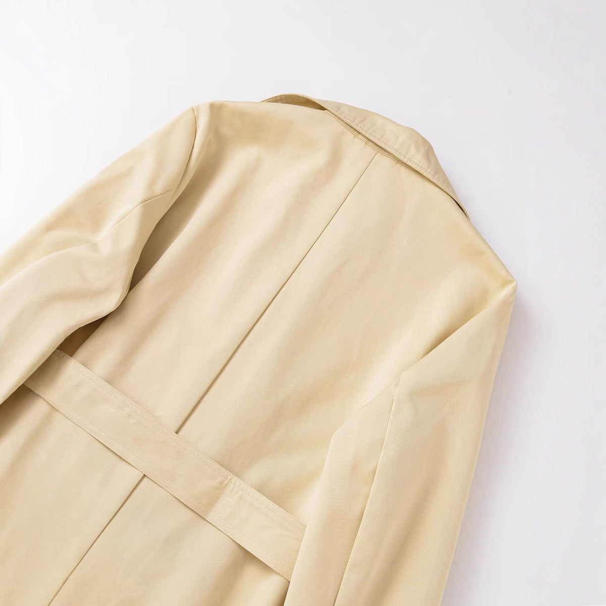Women's midi trench coat made of lightweight functional fabric with tied belt and storm flap EVA-US