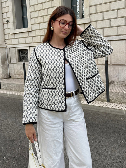 Women's quilted short jacket with allover pattern and contrasting piping EVA-US