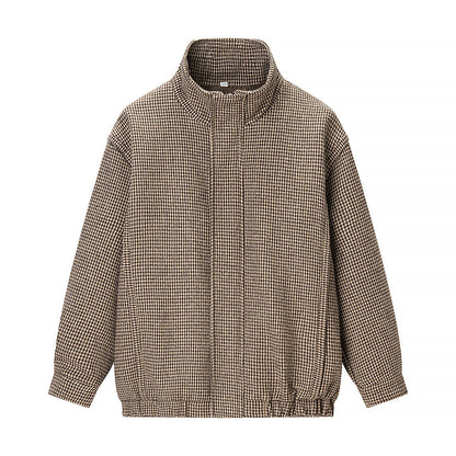 Women's transitional jacket in houndstooth pattern with stand-up collar and elastic hem