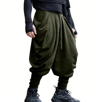 Men's avant-garde harem pants with wrap front, elastic waistband, and narrow lower leg EVA-US