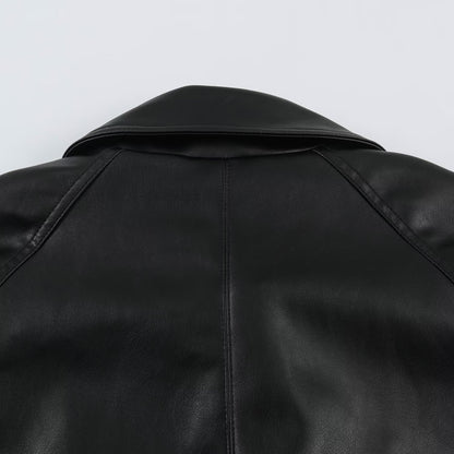 Women’s short jacket made of faux leather with a waist belt and oversized sleeves EVA-US